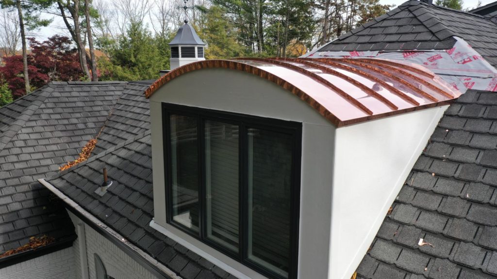 Image of curved copper standing seam roof Installed by Alte Exteriors copper roofing contractor
