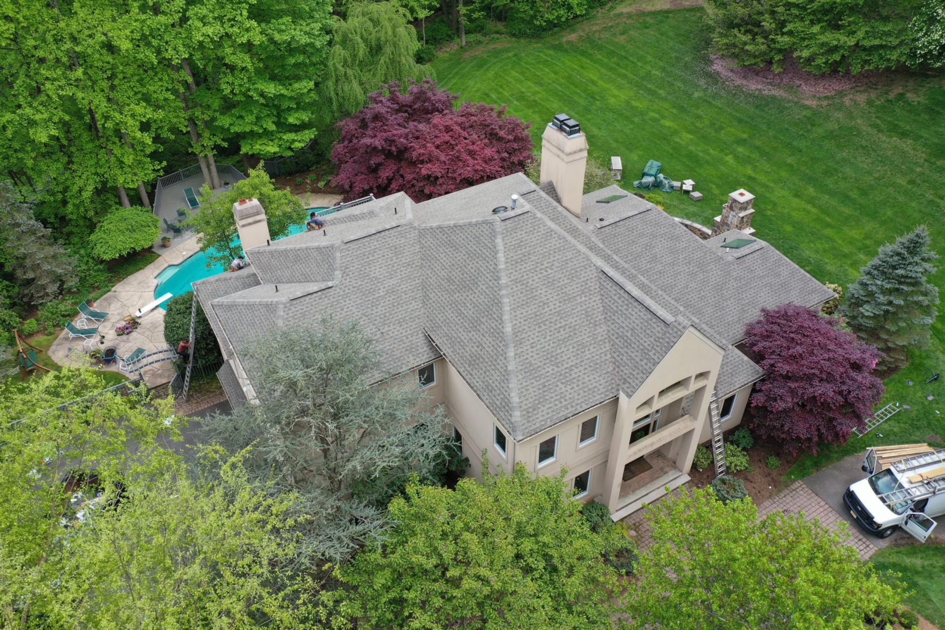 Cedar shake roof on NJ Tudor home Chester, NJ home with GAF Timberline roof system