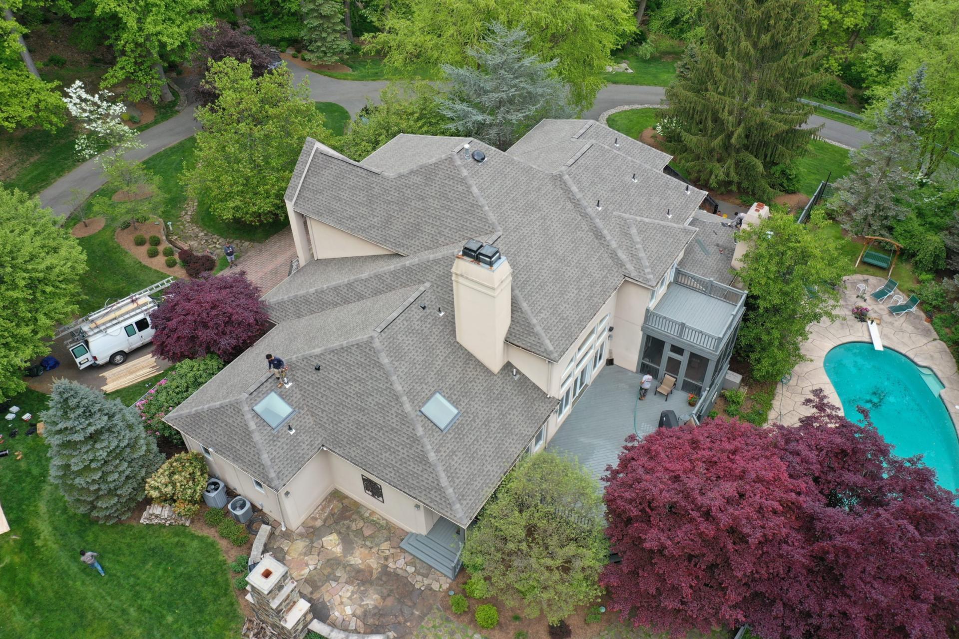 Gracious Tudor home with new cedar shake roof and Velux skylights Chester, NJ Home with Velux skylights and CAF Timberline roofing.