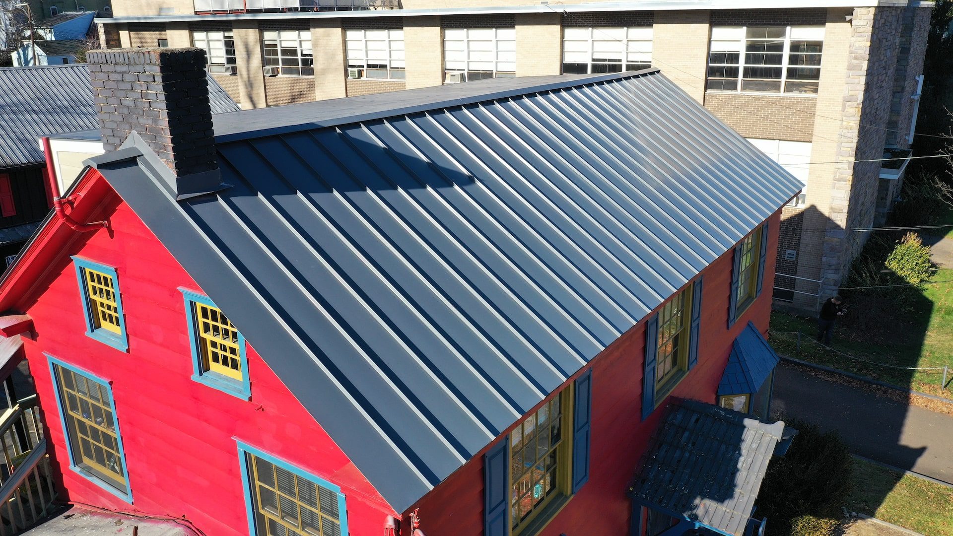 Lambertville metal roof-side-2-min Colorful roof transformation by Alte Exteriors in Lambertville NJ.